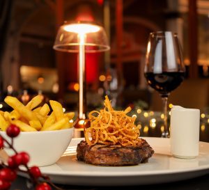 FIRE Christmas lunch and dinner Menu, Ribeye served with onion rings and chips